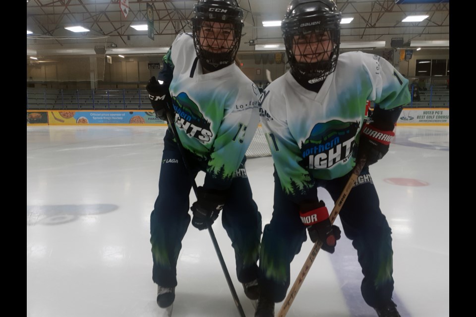 Amara Vaillancourt, left, and Avery Bjorn have been ringette teammates since they were eight years old. They are now playing for the provincial U-16 team that will represent BC at the Canadian double-A championships in Calgary in April.