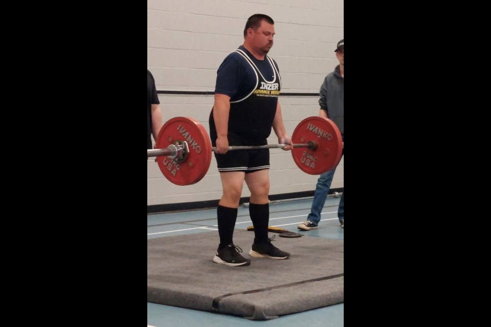 Adam Spokes performs a deadlift at the Special Olympics regional championships last weekend in Mackenzie.