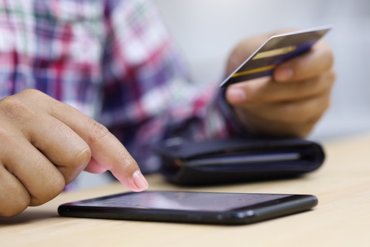 cell-phone-credit-card-getty-images