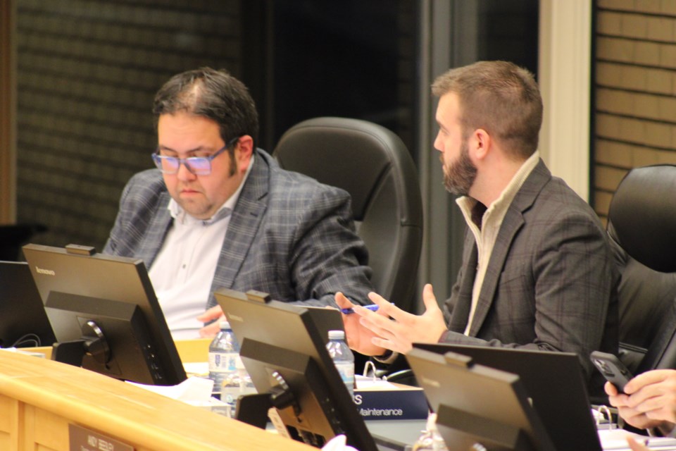 Coun. Kyle Sampson explains his rationale for calling for a decrease to the Prince George Public Library's 2025 funding increase as Coun. Tim Bennett looks on during day two of budget talks on Jan. 22, 2025.