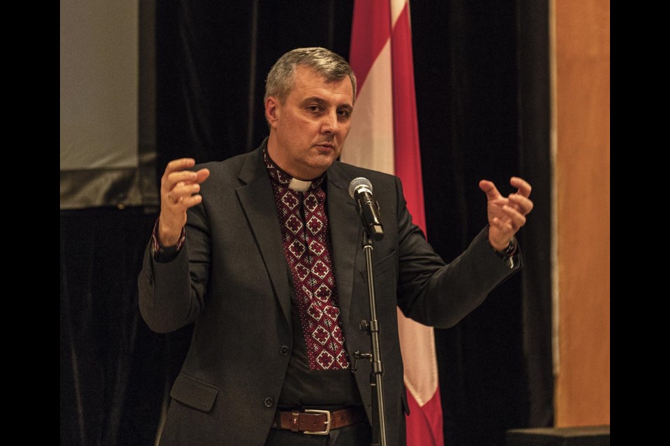 Father Andrii Chornenkyi of St. George's Ukrainian Catholic Church talks about the situation in  Ukraine at the showing of the movie Life to the Limit at Knox Performance Centre Sunday, Feb. 23, 2025.