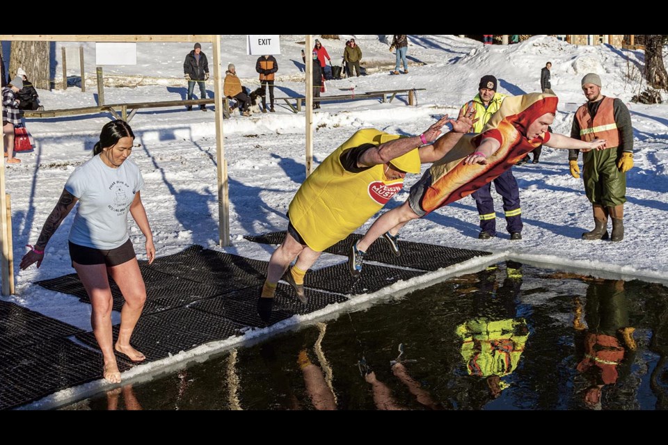 The 24th annual Polar Bear Dip was kicked off in spectacular costumed style by a hot dog and a bottle of mustard Wednesday afternoon at Ness Lake Bible Camp.