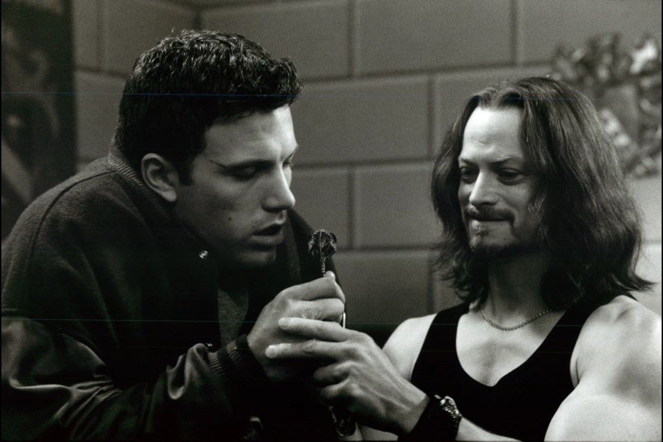 Ben Affleck and Gary Sinise work on a scene during filming of Reindeer Games in Prince George in 2000.