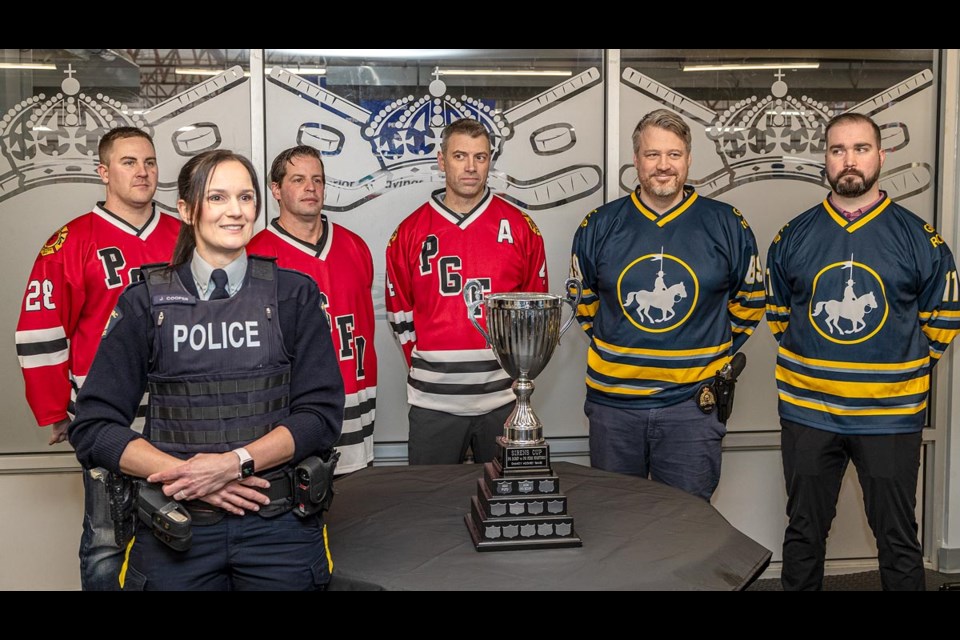 RCMP Cpl. Jennifer Cooper is flanked Thursday by members of the PG Fire Department and the PG RCMP hockey teams as they announce additional fundraising incentives for the 2025 Sirens Cup hockey game to be held Kopar Memorial Arena at 2 p.m. on Saturday, January 25.
