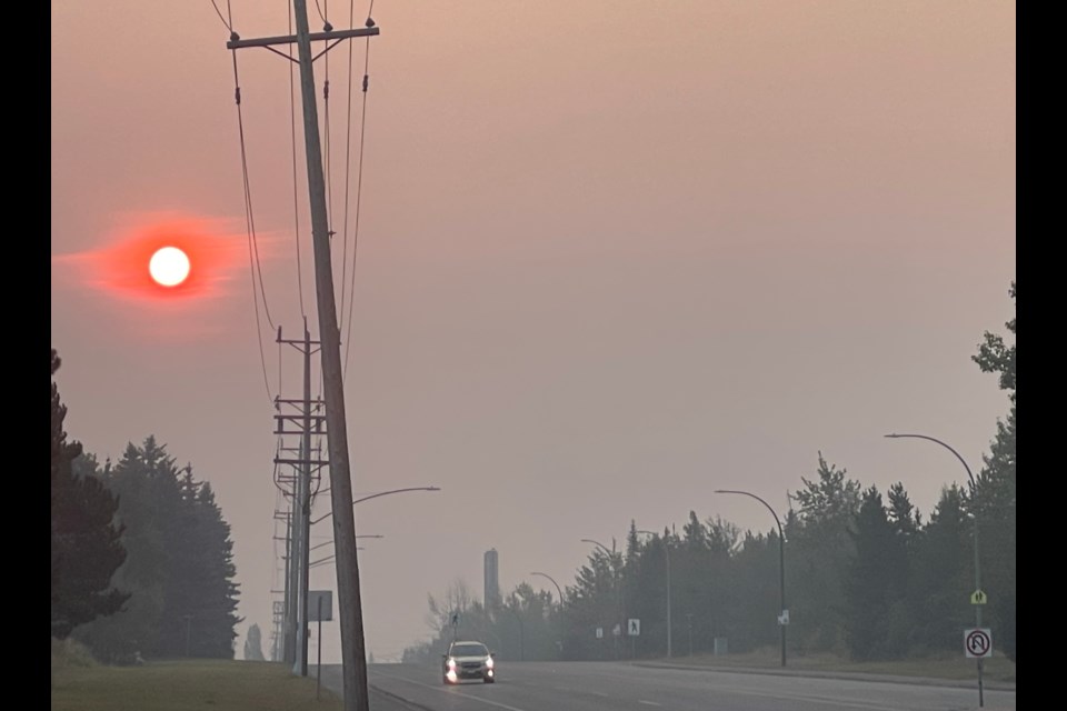 Hazy wildfire smoke lingers over Prince George, B.C. early on the morning of Saturday, Sept. 7, 2024.