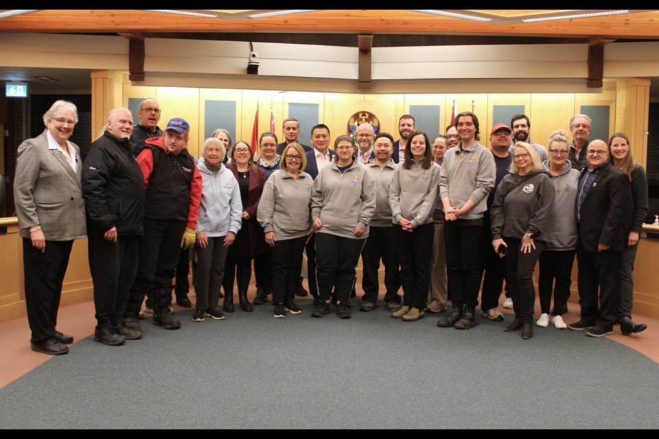 Prince George city council, Special Olympics organizers and athletes smile after council approved a bid for the 2030 Special Olympics Canada Summer Games at its Monday, Feb. 24, 2025 meeting.