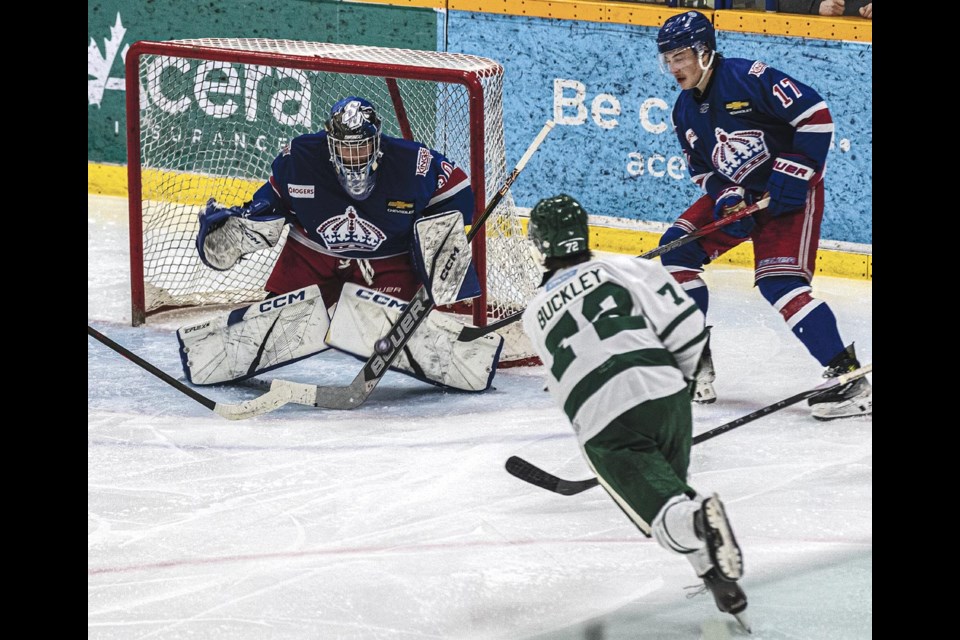 Crusaders forward Tristan Buckley's shot is stopped by Spruce Kings goalie Charles Gravel Sunday March 16 at Kopar Memorial Arena.