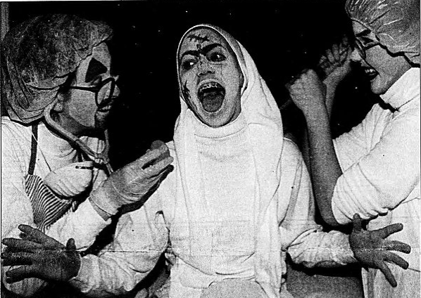 Nov. 1, 1997: Trick-or-treaters get a shocking welcome at the Coole home on Halloween night. Amber Maguire, left, and Jocelyn Stacy, right, were operating on Danya Coole just inside the front door. No candies were given out until Danya had let loose with a good scream or two.