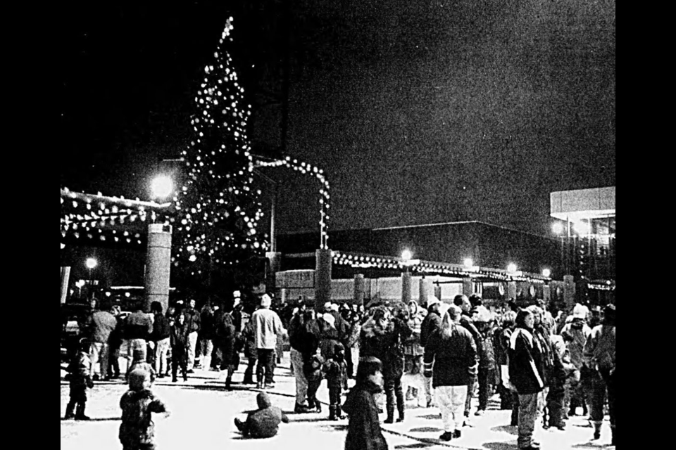 Nov. 29, 1996: Hundreds of people take part in the lighting ceremony, which turned on Christmas lights at the plaza, city hall and throughout the downtown, outside the Civic Centre. Outgoing Mayor John Backhouse and mayor-elect Colin Kinsley flipped the “light-up” switch together. The ceremony also marked the first day of the Festival of Trees.  