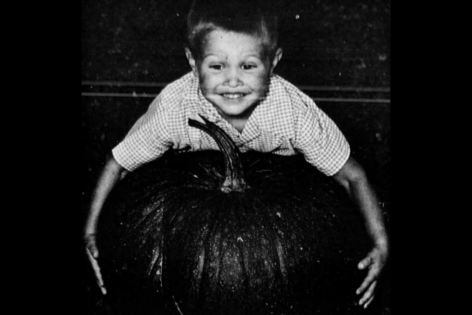 Sept. 20., 1965: ‘Wow, that’s a big one.’ Three-year-old Gordy Thorp of 690 Carney St. tries to lift the pumpkin his father Al Thorp grew in the back yard. The pumpkin weighed in at 48 pounds. 