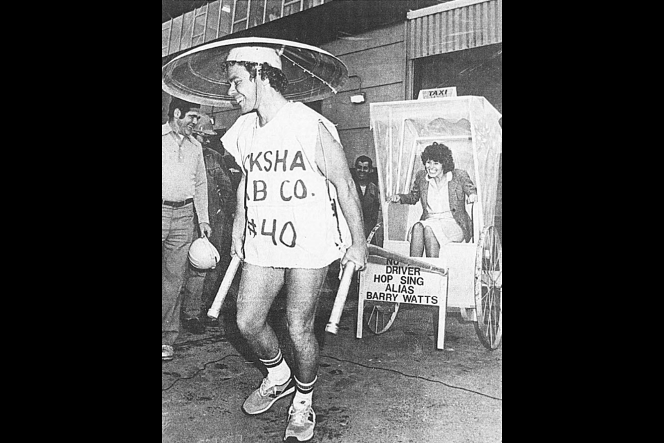 Nov. 7, 1980: Barry Watts pulls wife Margaret in an unusual vehicle given to him as a farewell present by his fellow pipefitters at Prince George Pulp. When he announced he was quitting his job to buy into a taxi business, the others built him this rickshaw, complete with driver’s outfit.