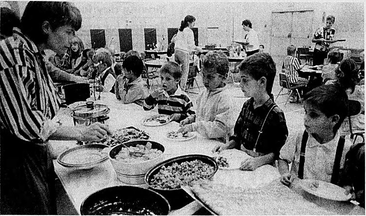 Oct. 8, 1988: Bev Smith dishes up some vegetables for Edgewood Elementary students during the annual Thanksgiving dinner prepared and served by the students’ parents. During the lunchtime meal, the students gobbled up more than 60 pounds of turkey plus all the trimmings and, in thanks, performed a skit for their parents. 