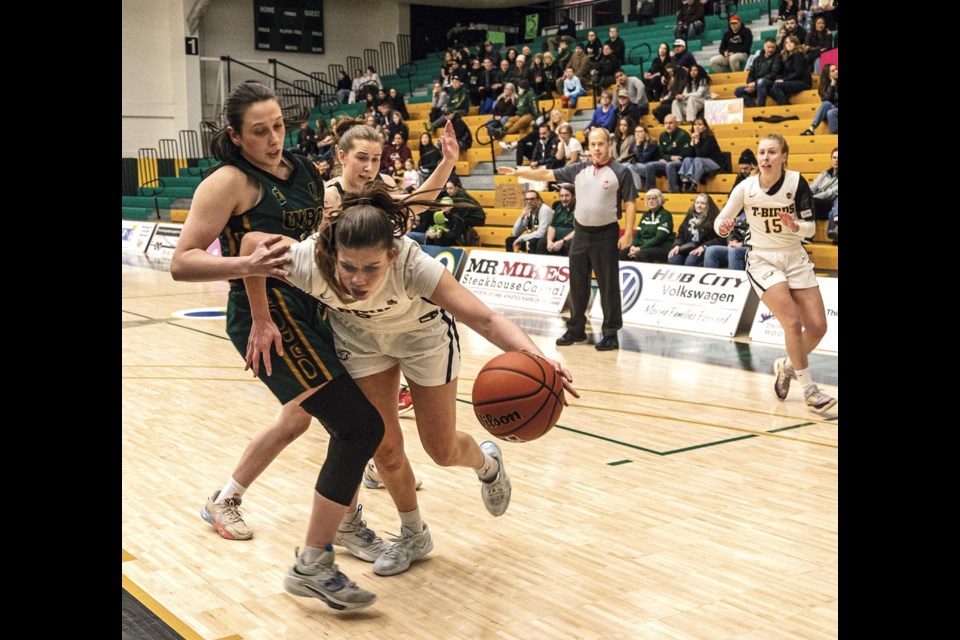 Thunderbirds forward Sofia Bergman dribbles around Timberwolves forward Sveta Boykova Saturday Feb 15 at Brownridge Court.