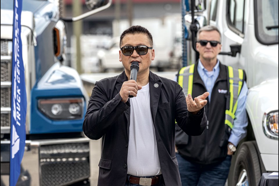 Prince George Mayor Simon Yu, with Velocity Truck Centres president Rod Graham, speaks to the importance of the merger of Prince George Western Star and Prince George Freightliner, the north's first hydrogen vehicle service bay and a collaborative program with CNC to train technicians in hydrogen truck service.