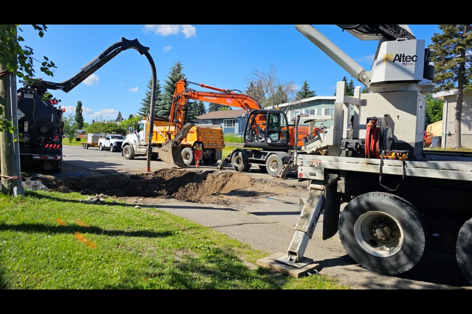 Crews work to repair a water main break at the corner of Ahbau Street and Rainbow Drive on Thursday, July 4, 2024 in Prince George, B.C.  Ahbau was closed between Rainbow and 10th Avenue.
