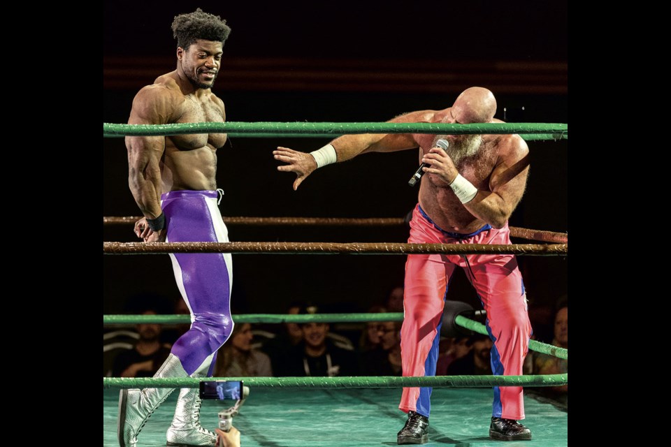 Andy Anderson describes the physical attributes of his opponent Mighty Lokombo during the Battle of the Bods prior to their wrestling bout Saturday night at the Prince George Civic Centre.
