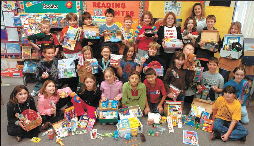 Nov. 16, 2006: Students in Sarah Bonner’s Grade 5 class at Hart Highlands elementary show off the shoeboxes they filled to be sent to Third World countries through the Samaritan’s Purse Operation Christmas Child. The students collected the items over the past week and put the boxes together in class.