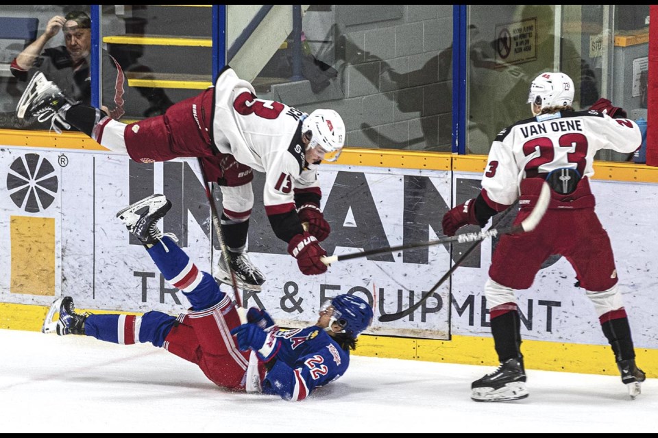 Chilliwack Chiefs forward Connor Dick drops onto Spruce Kings defenseman Trent Ballantyne after they collide Friday Feb 21 at Kopar Memorial Arena.