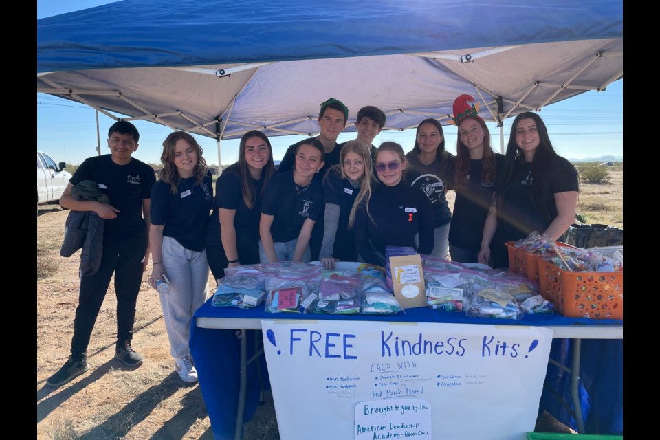 The National Honor Society group from American Leadership Academy - Queen Creek High School volunteered and assisted by acting as personal shoppers and showing them around as well as offering them free kindness kits, which included hygiene products and messages of encouragement that they put together.