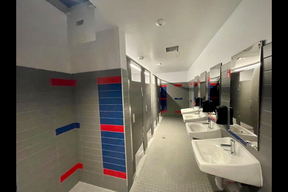 Crismon High's new bathrooms sport the school's colors of Carolina blue and red.