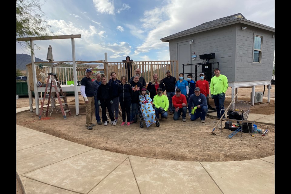 McCarthy Heart Hats, a volunteer group associated with McCarthy Building Companies, transformed the Blands’ backyard playground into a wheelchair-accessible wonderland, adding a new wheelchair lift, a specially adapted swing set that Kaylee can enjoy with her siblings, plus new sidewalks, paint and artificial turf.