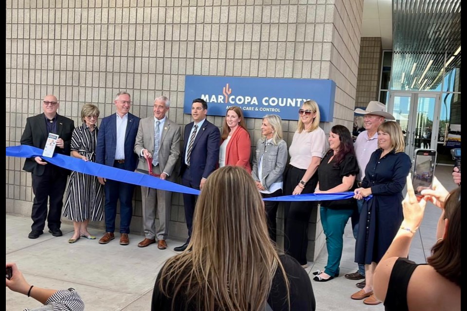 Queen Creek Councilmember Jeff Brown, far left, attended the VIP grand opening of the new Maricopa County Animal Care and Control East Valley Animal Care Center in Mesa on May 1, 2024, along with dozens of public officials, animal advocates and more for a ribbon-cutting ceremony and a sneak peek of the facility before it opened to the public at noon on May 2, 2024.