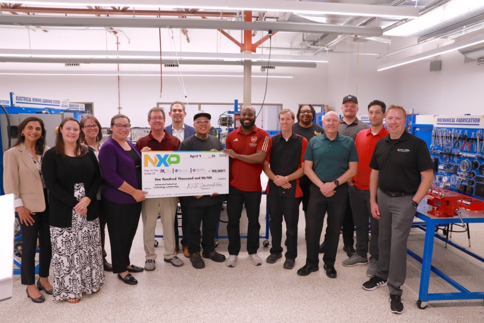 From left: Nilam Patel, Karley Mellberg (MCCF); Becky Baranowski (EMCC), Nicole Steverson, Scott Hibben, Geno Fallico (NXP); NXP scholars Hao Yang, Khalil Ross; Brian Kohlenberg (MCC); NXP scholar Eric Snelling, Ken Hackler (MCC); NXP scholar Harry McCool, Matt Rayman and Michael Voss (MCC).