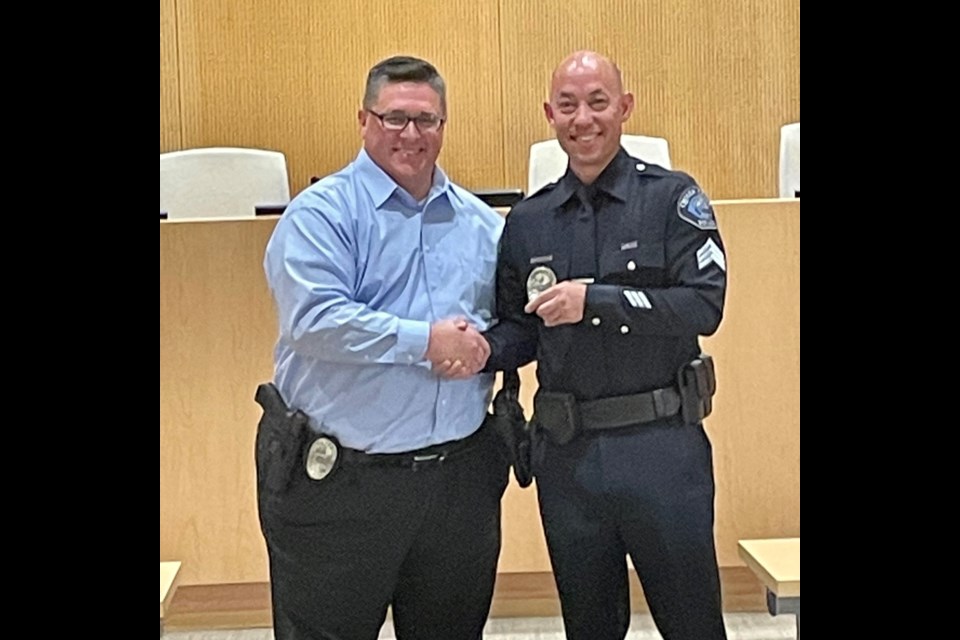 Queen Creek Police Chief Randy Brice, left, congratulates Sgt. Michael Jost on April 25, 2022.