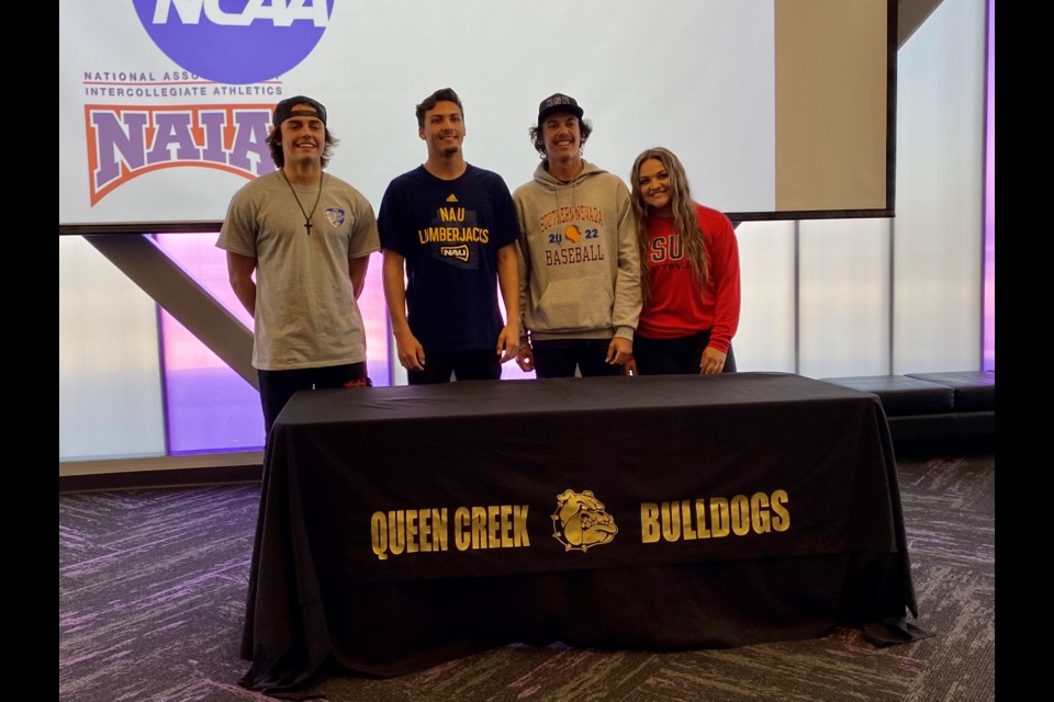 Hard work and dedication paid off for four Queen Creek High School athletes on National Signing Day, Feb. 2, 2022.