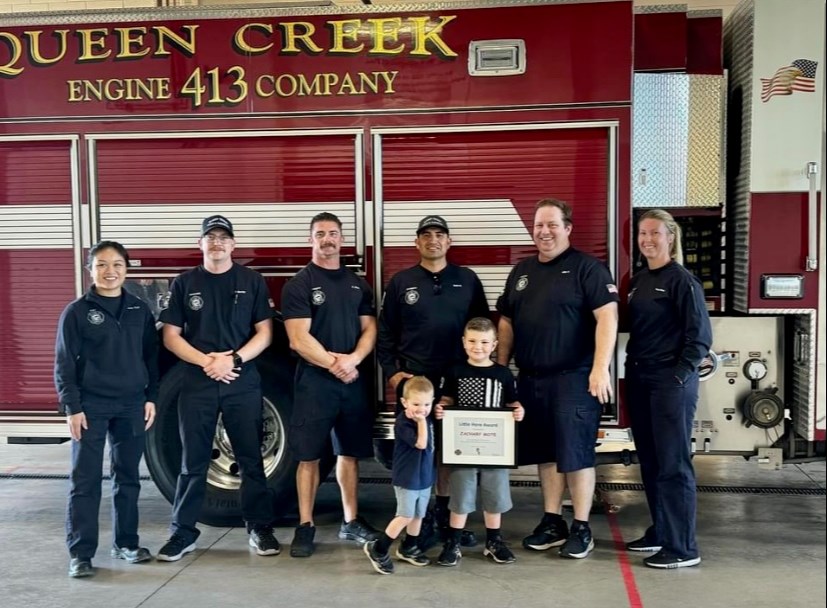 Queen Creek Firefighters Association IAFF Local 2260, the Queen Creek Fire and Medical Department, recognized a brave young man last week who stepped up and knew exactly what to do when his brother needed his help in their pool.