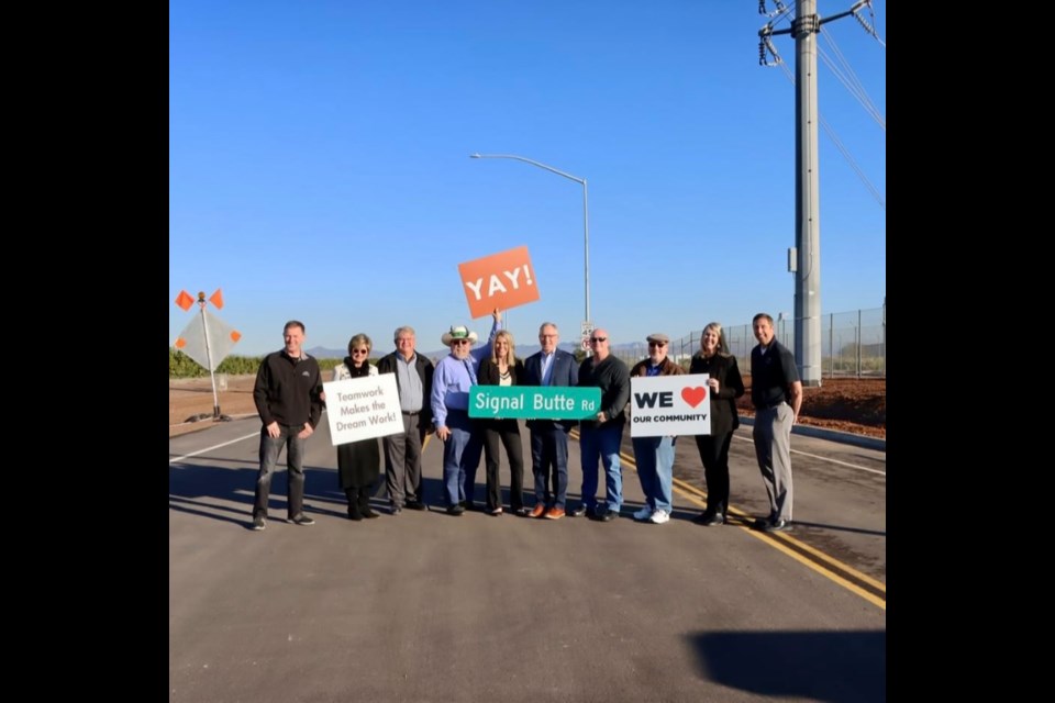 City of Mesa Mayor John Giles, Mesa council members Kevin Thompson, Julie Spilsbury, Jen Duff and Scott Somers celebrate the opening of Signal Butte Road at the State Route 24 with Queen Creek Vice Mayor Jeff Brown, Queen Creek Mayor-elect Julia Wheatley and Queen Creek Councilman Robin Benning on Dec. 14, 2022.