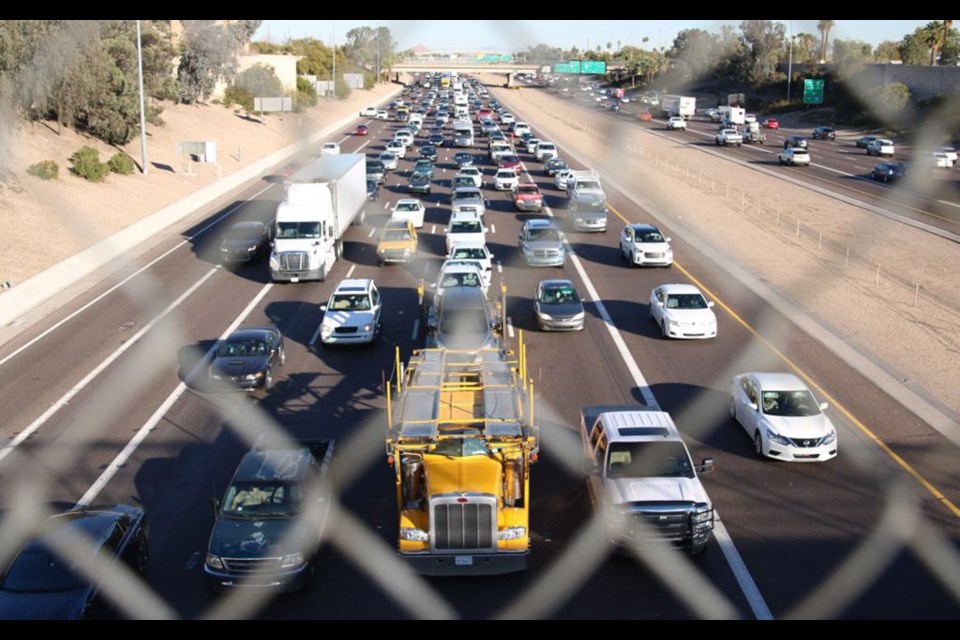 Rush hour traffic on Interstate 10 through Phoenix in a 2018 file photo. New data from the National Highway Traffic Safety Administration shows that the number of traffic fatalities in the first nine months of 2021 jumped sharply from previous years, both in Arizona and the U.S. as a whole.