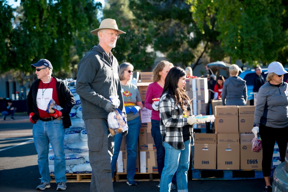 With the holiday season in full swing, United Food Bank is gearing up for its December holiday meal food distribution. They anticipate serving an estimated 1,800 families at their annual drive-through food distribution at the Mesa Convention Center Dec. 19, 2022. Anyone in need can come and receive food at this drive-through distribution. Walk-up service is also available for people without vehicles.