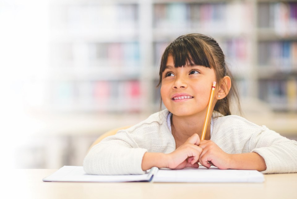 young-girl-in-school-stock-image