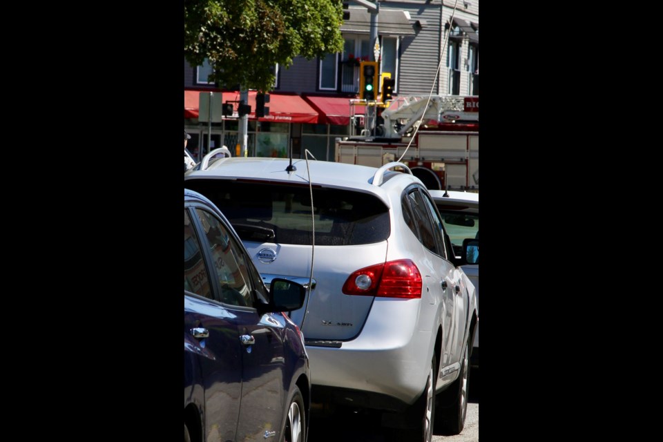 The power line on top of the parked car in Steveston on Friday afternoon