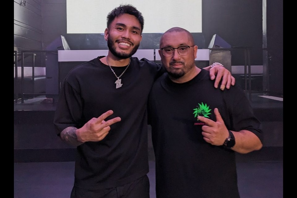 Richmond filmmaker and director Justin Soliven Villarosa (left) and Richmondite Paolo Valdés on the set of "The Bouncer."