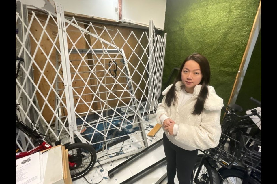 Richmond E-Bike owner Tram Pham was surveying the damage after a truck apparently smashed into their east Richmond storefront.