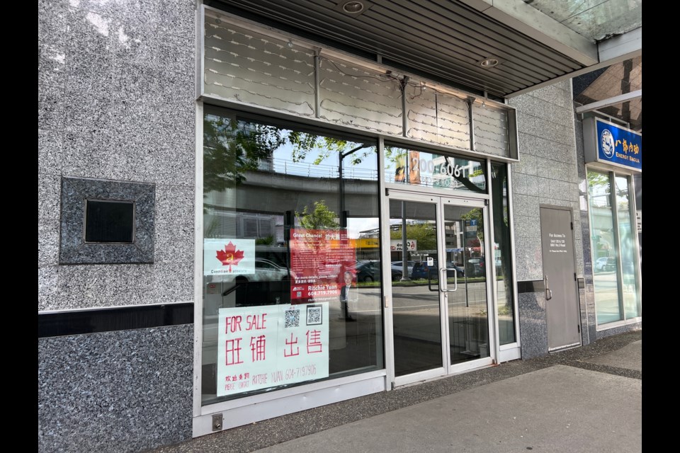 Disbarred lawyer Hong Guo's office unit in Richmond city centre is up for sale.