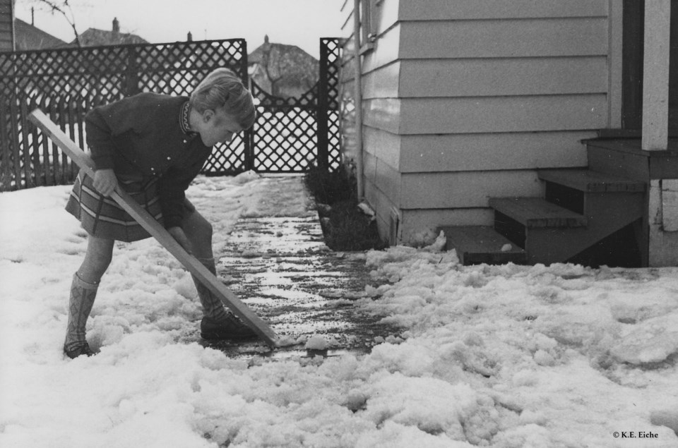 scraping-sidewalk-of-ice