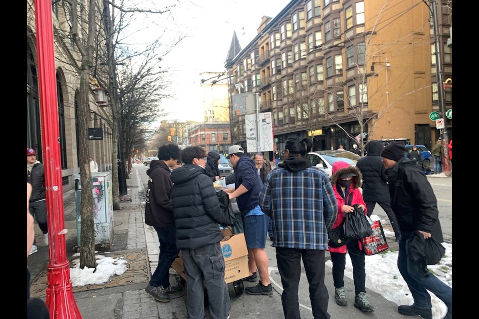 J.N. Burnett students handed out care packages on Vancouver's Downtown Eastside on Friday.