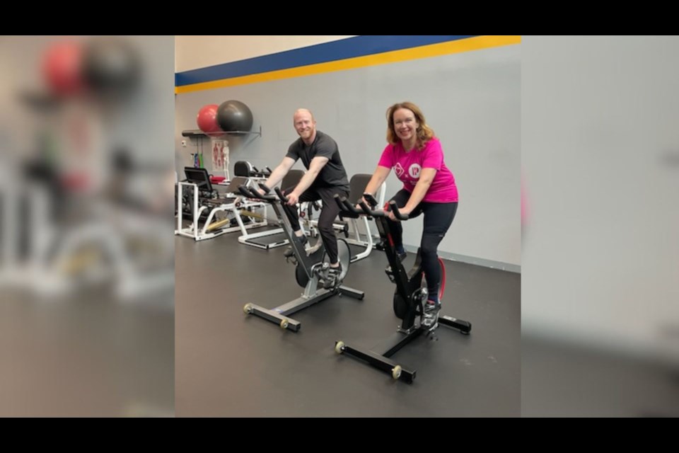 Ruth Kelly (right) and the owner of Proactive Health will cycle a 10-hour relay.