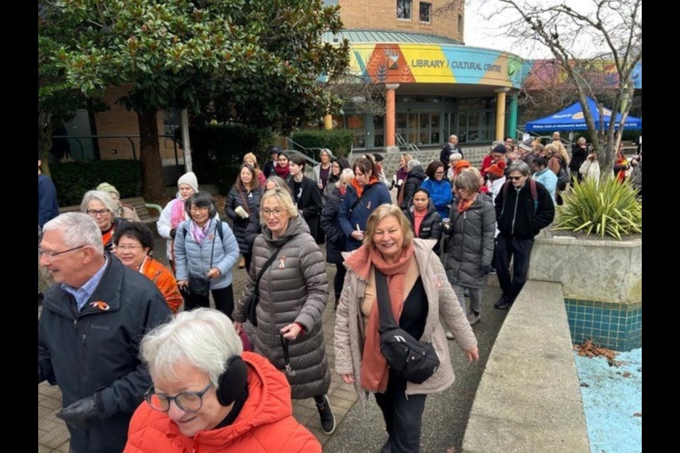 A vigil and march were held in Richmond on Friday to combat violence against women.