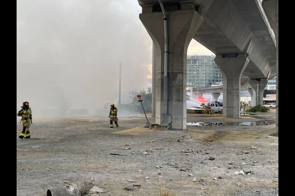 Firefighters putting out a fire near Bridgeport area.