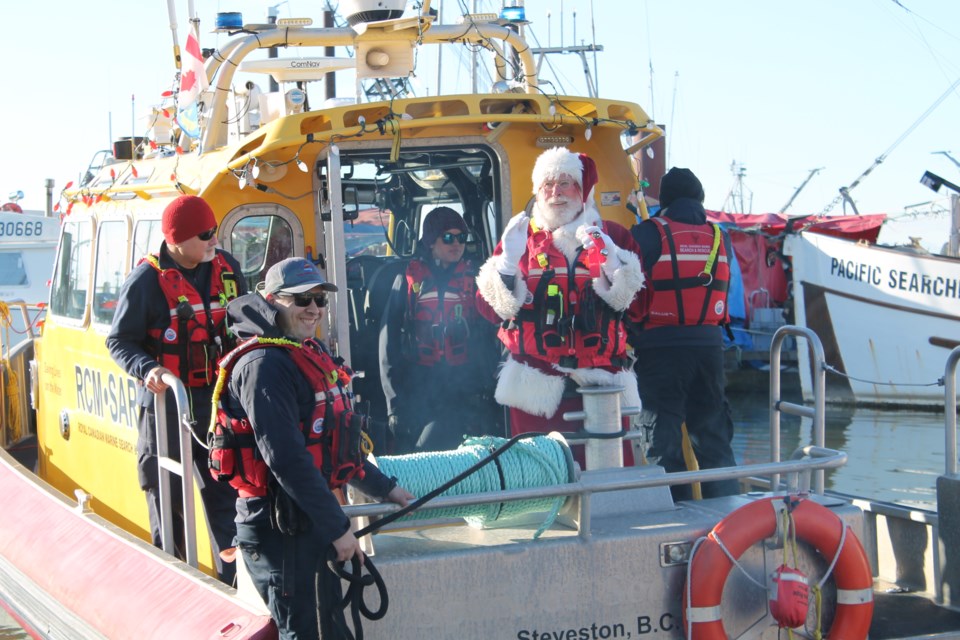 Santa arrived by boat at Steveston's Fisherman's Wharf on Sunday, Dec. 4.