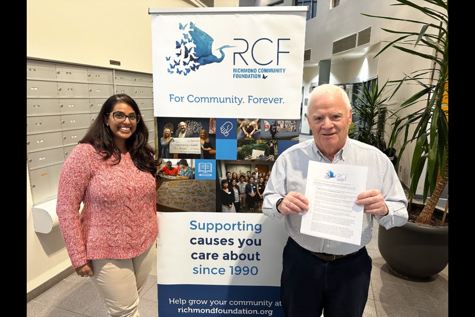 Maryam Bawa, vice chair of the Richmond Community Foundation (left), with Don Taylor, President of the West Richmond Community Association with a recently created scholarship fund to honour the memory of Hans Havas, who passed away this summer.