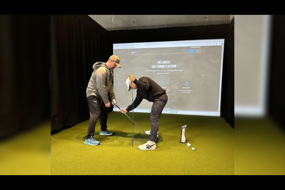 Richmond's Precision Golf Academy's simulator bays can be used by three or four people at a time. 