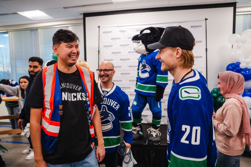 Heinen, Bains and team mascot FIN's backstage visit to the Amazon fulfilment centre on Blundell Road 