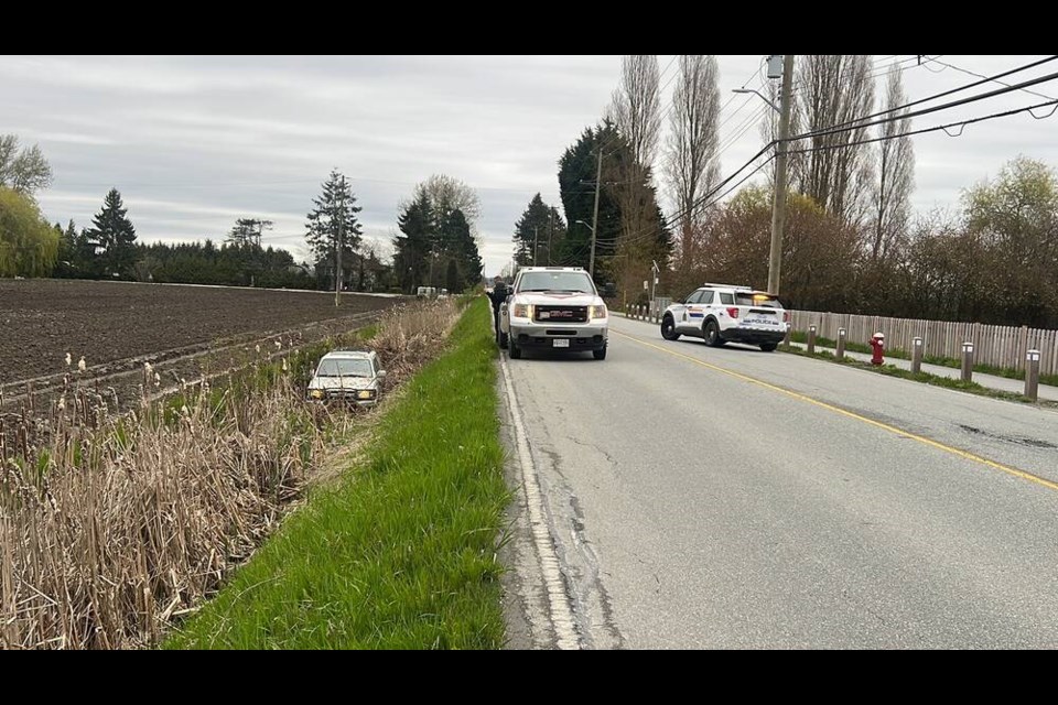  A white car was spotted in a ditch on the farmlands by Westminster Hwy on Saturday. (Sukhwant Dhillon)  A white car was spotted in a ditch on the farmlands by Westminster Hwy on Saturday. (Sukhwant Dhillon) 