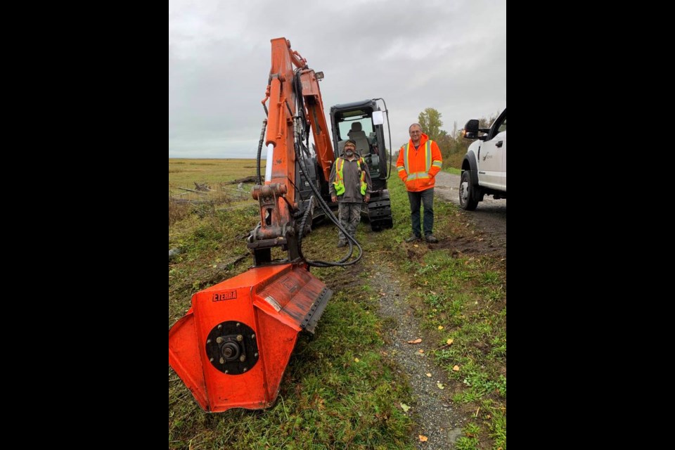 City of Richmond workers inspecting the West Dyke Trail earlier this week. Grant McMillan photos 