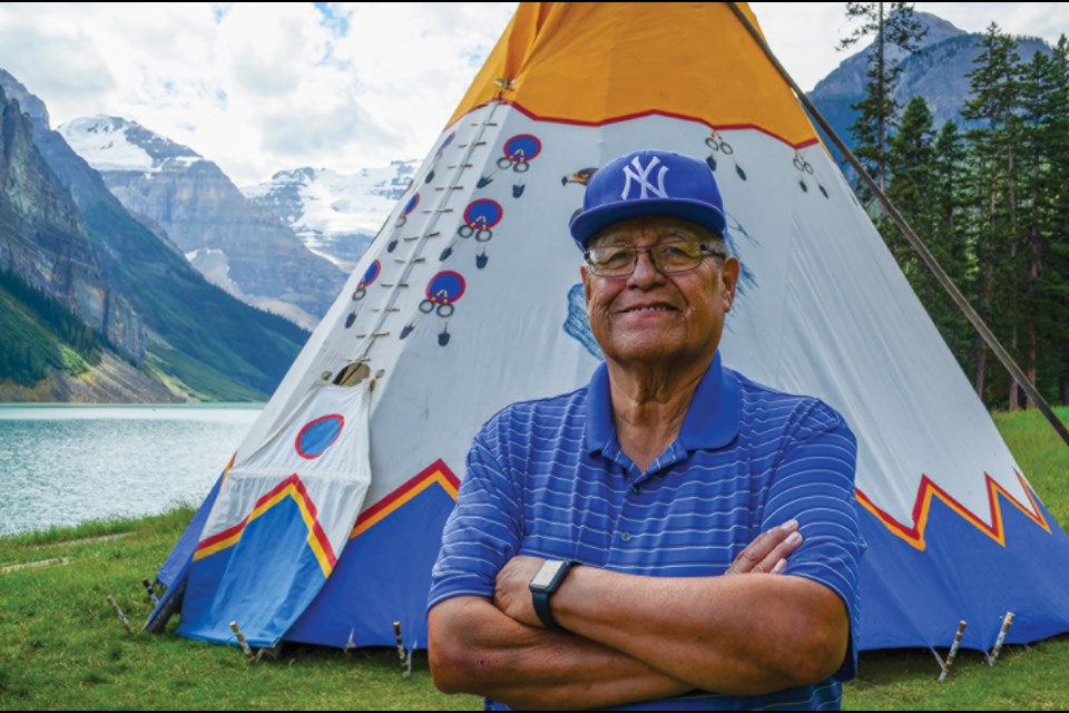 Bearspaw Councillor Rod Hunter poses for a picture in front of the Stoney Nakoda teepee at Lake Louise on Monday (Aug. 24). JENNA DULEWICH RMO PHOTO